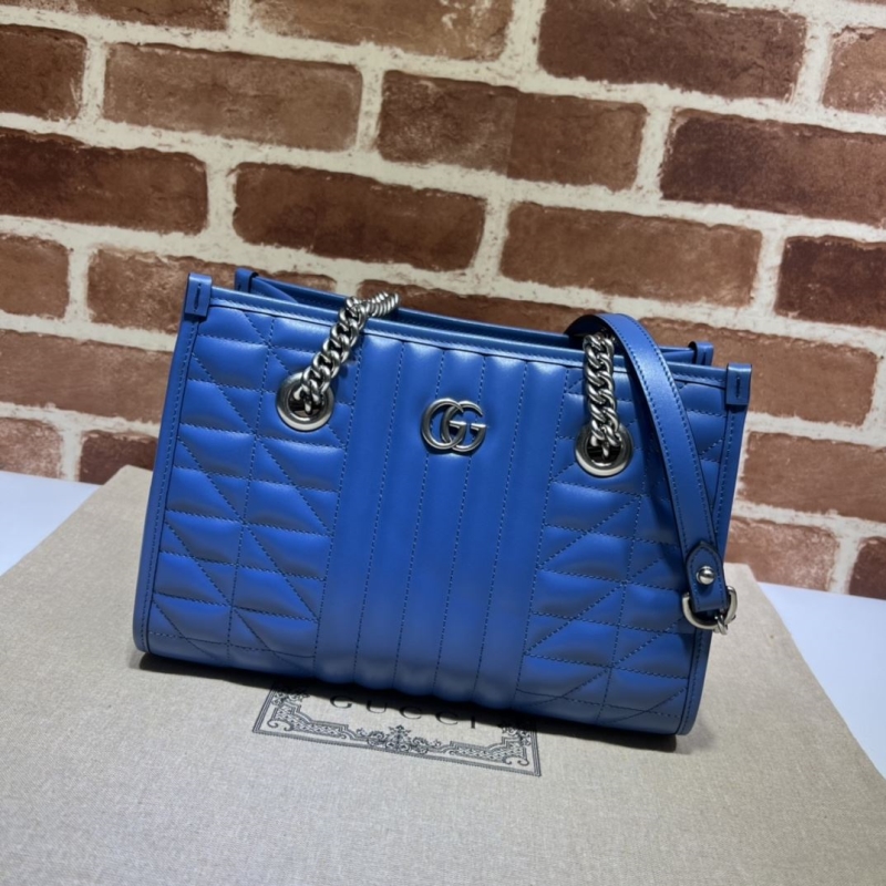 G*u*i shopping bags